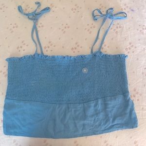 Blue stretchy crop top with adjustable straps